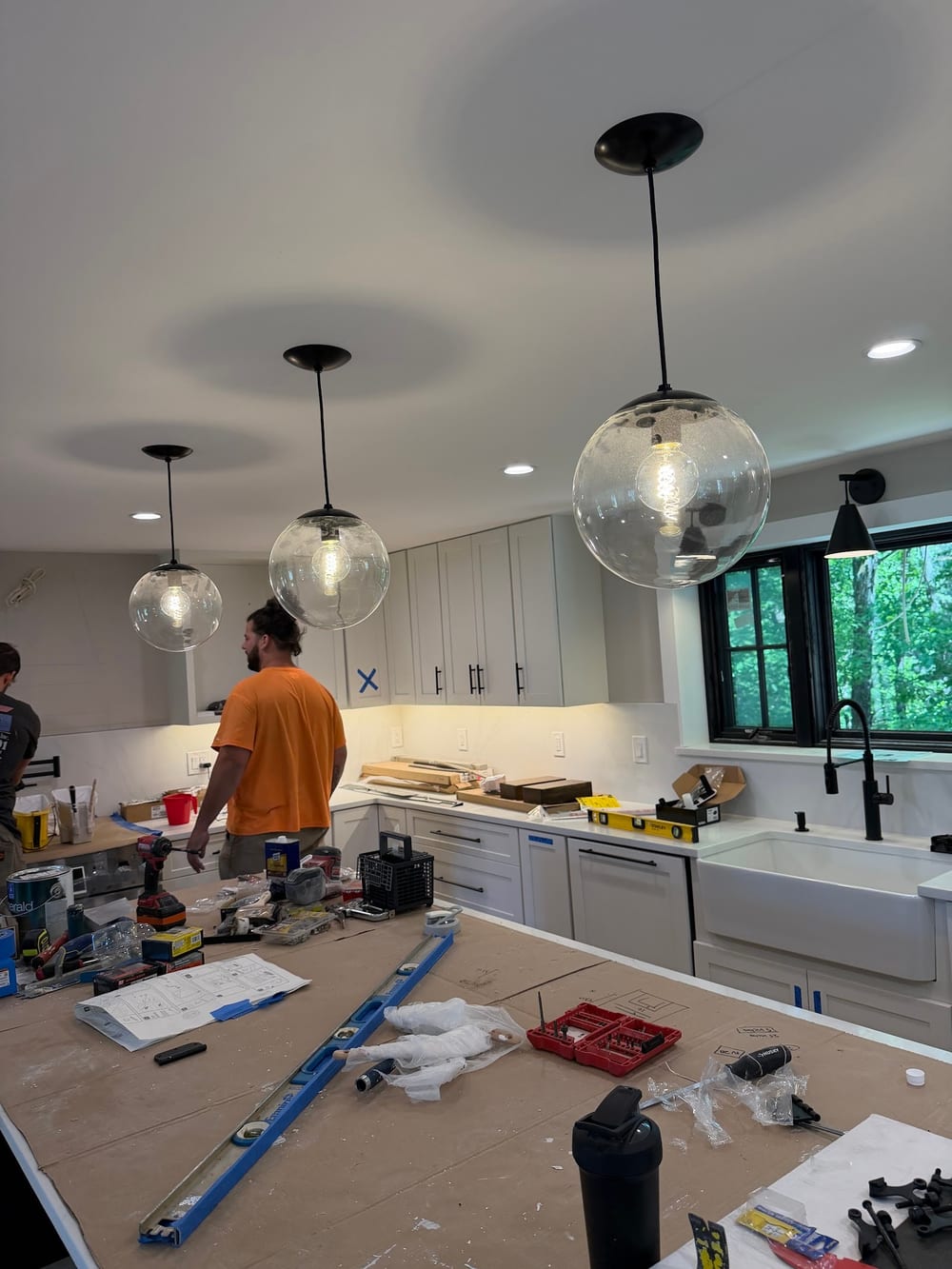 Mike Mejia Electrical working a kitchen lighting job