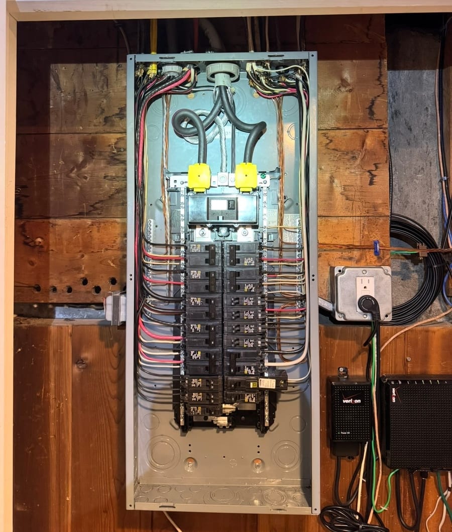 Breaker panel with neat color-coded wiring by Mike Mejia Electrical